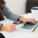 Portrait beautiful young asian woman use credit card with laptop